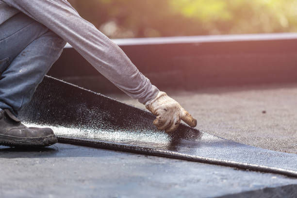Professional Waterproofing technician working in Deer Lodge, TN